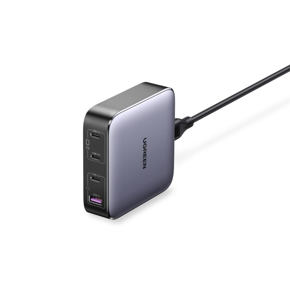 UGREEN 100W GaN PD desktop charger standing upright with its four charging ports and connected power cable visible.