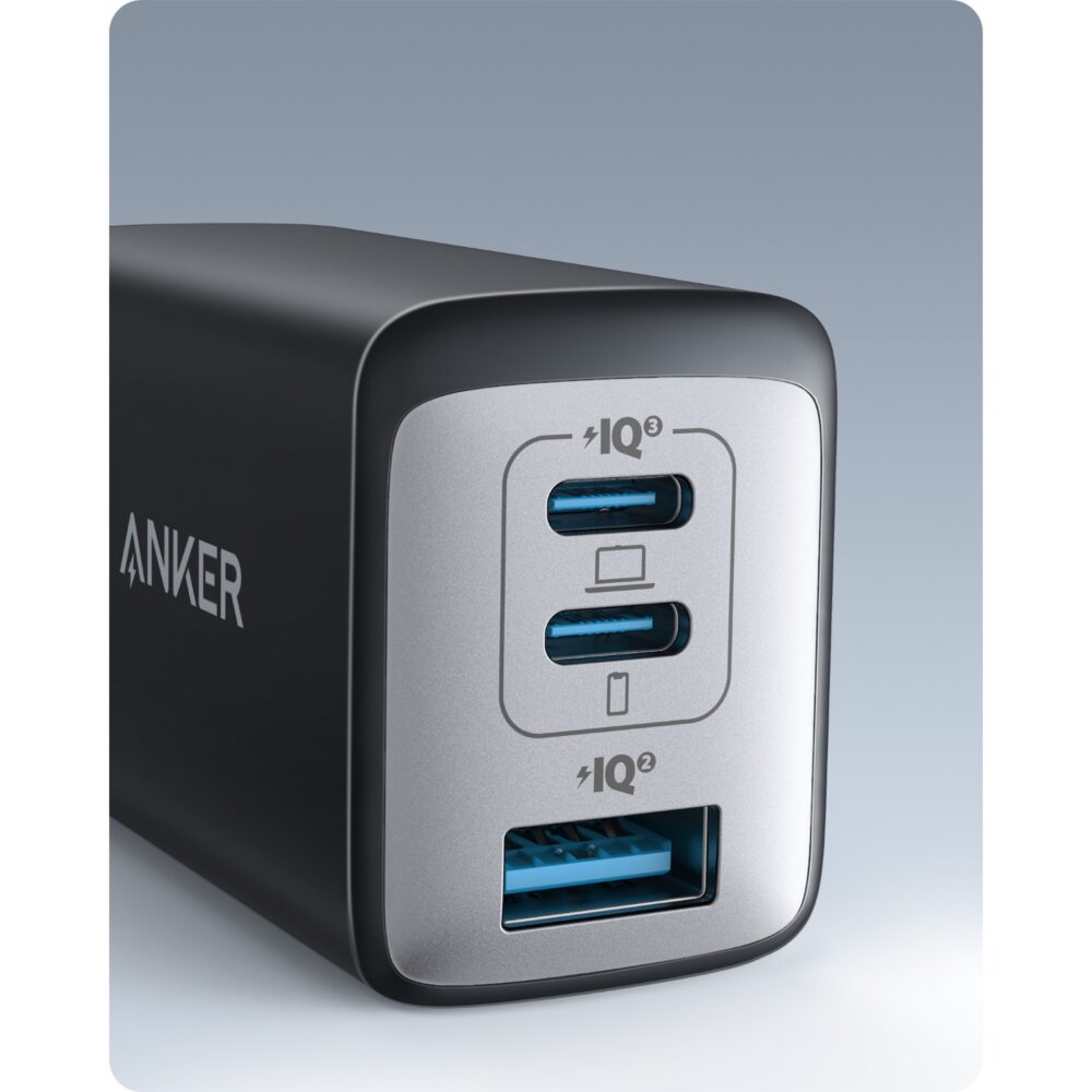 Close-up of the three charging ports on the black Anker 65W GaN PD Wall Charger