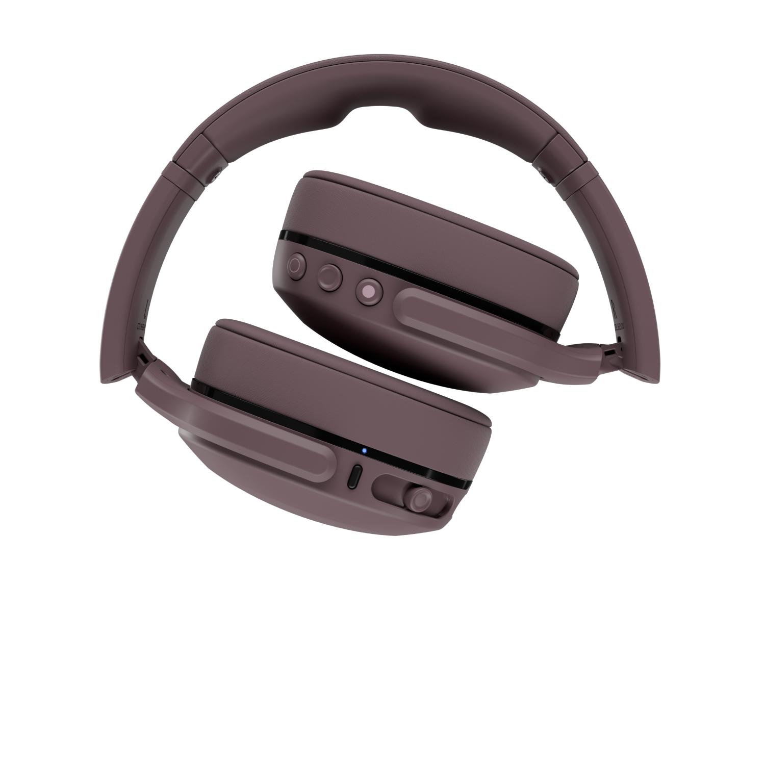 Skullcandy Crusher® 540 Active wireless headphones in Smoke shown folded into a compact position with the earcup controls visible