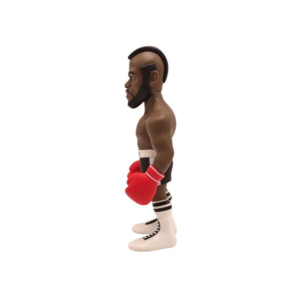 Side view of the Clubber Lang Minix Figurine, emphasizing his aggressive stance and focused expression.