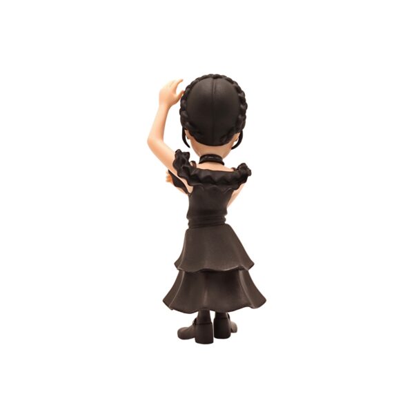 Back view of the Wednesday Addams Minix Figurine, highlighting the details of her dress and hair.