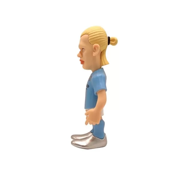 Side view of the Erling Haaland MINIX Figurine, emphasizing his strong, athletic pose and determination.