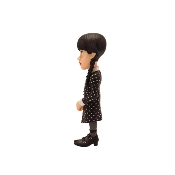 Side view of the Wednesday Addams MINIX Figurine, emphasizing her iconic stance and expression.