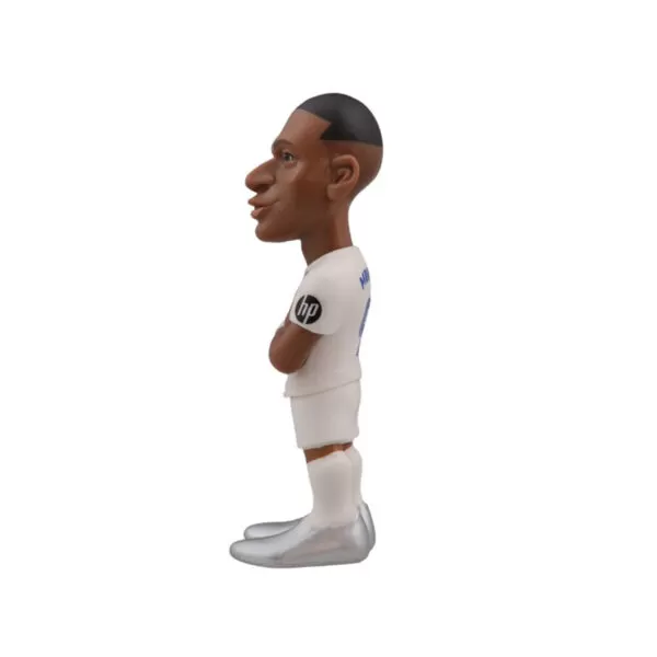 Side view of the Mbappe Minix Figurine, emphasizing the lifelike proportions and action-packed design.